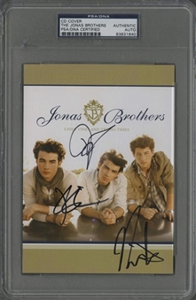 The Jonas Brothers Group Signed "Lines, Vines, and Trying Times" CD Cover (PSA/DNA)